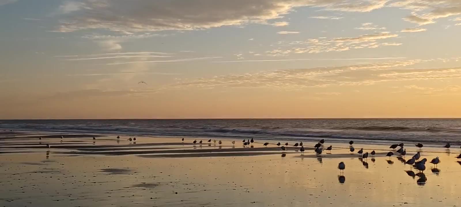 Sunset over a Naples beach